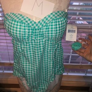 1 piece Lauren James swimsuit. Color: Aqua mist.